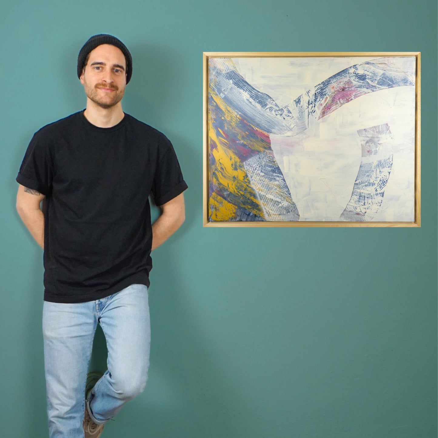 Max Lanzinger standing next to modern art acrylic painting.